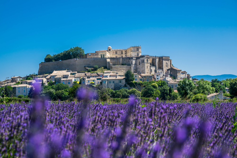 Where to go in Europe in June shutterstock 1929003269 cbegir grignan village medieval de drme en auvergne rhone alpes france