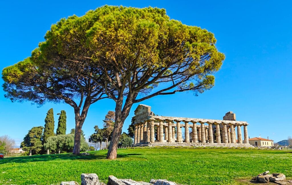 shutterstock 2498558961 ©sirio carnevalino paestum italy the ruins of paestum are famous for their three ancient greek temples in the doric order dating from about 550 to 450 bc