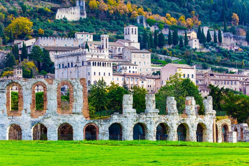 shutterstock 2080093240 ©kavram roman amphitheater built two thousand years ago. magnificent renaissance palace. the city of gubbio in the umbrian mountains. winter cold and windy day. italy