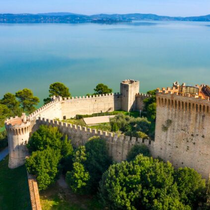 Home shutterstock 2373183451 ©stefano tammaro view on fortress of the lion in center of castiglione del lago in umbria italy. the castle is located on lake trasimeno in the province of perugia